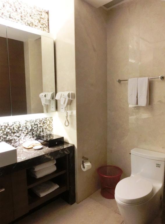 Estay Residence • Poly Central Pivot Гуанчжоу Номер фото